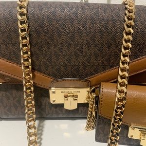 Used Michael Kors Brown MK purse and belt.